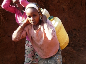 A young girl carries a 20 liter jerrycan at Linjoka, Igembe North. Water shortage remains a biting problem in the area.